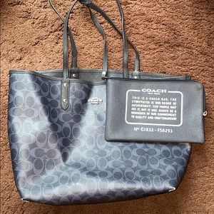 navy blue Coach bag with matching wristlet